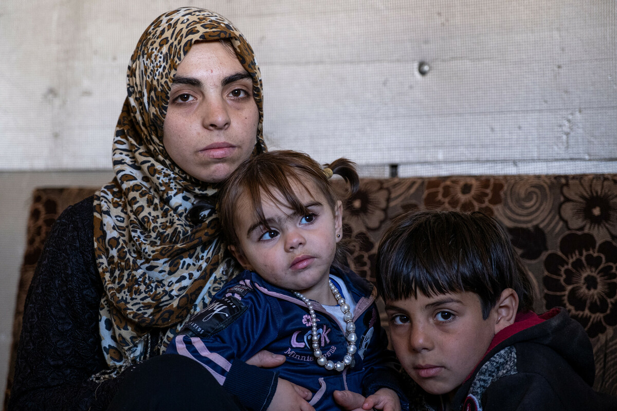 Syrian family of mother and two small children.