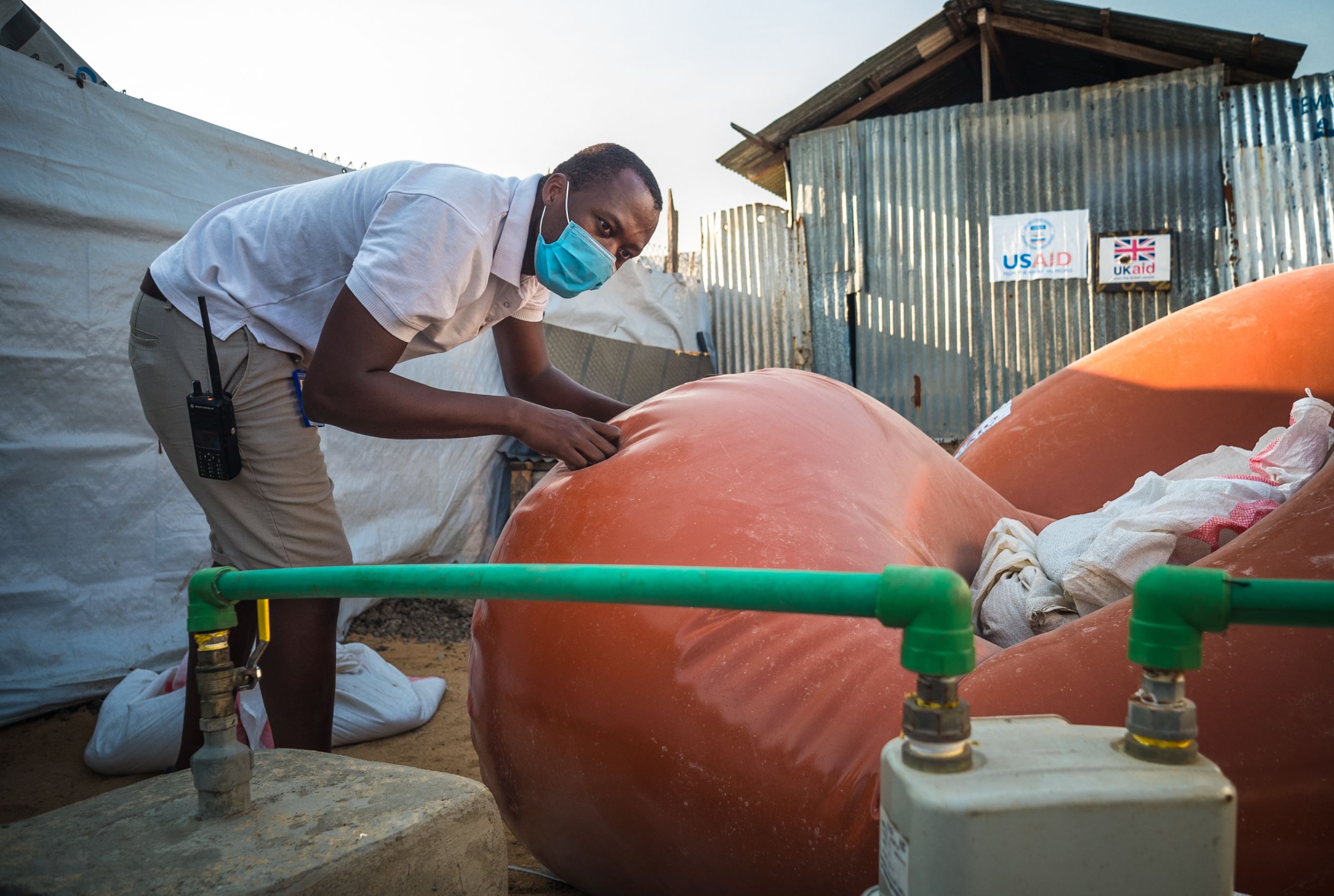 Energy expert Geophrey Oyugi checking on the biogas plan he helped restore and optimise in a refugee camp of Malakal, South Sudan.